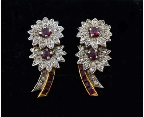 Ruby and diamond drop earrings in the form of two flowers, in unmarked white and yellow gold. 