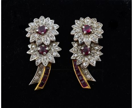 Ruby and diamond drop earrings in the form of two flowers, in unmarked white and yellow gold. 