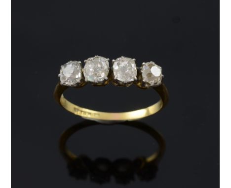 Victorian four stone cushion cut diamond ring. total diamond weight 1.2 carat 