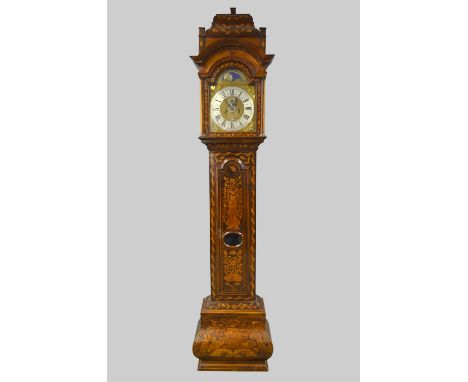 18th century walnut and Dutch marquetry long-case clock the case with bombe base profusely inlaid throughout  in typical mann