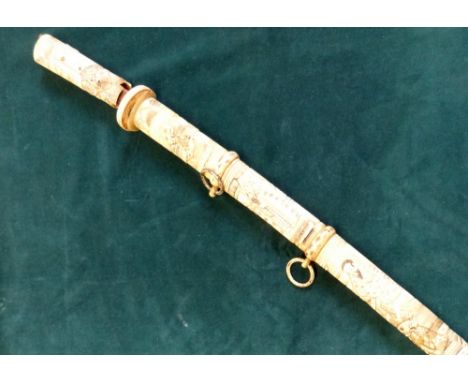 A Japanese sword in ivory and bone (def), and a Japanese sword mounted in a leather scabbard. 101 com long overall