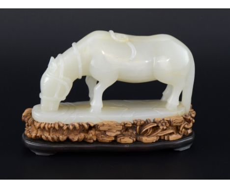 Chinese white jade figure of a horse on carved stand 14cm wide 