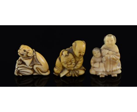 Ivory Netsuke designed as a 'Dog with a bag of rice', another with mask of wind and a third similar with a shawl.