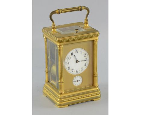 19th  century brass and glass repeating carriage clock with lever escapement. porcelain dial with subsidiary alarm dial 20cm 