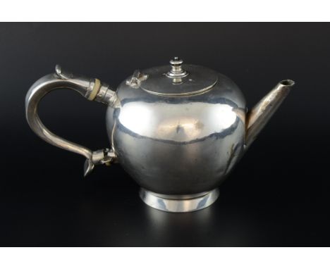 George I silver teapot of ovoid form with scroll handle on round foot, marks for Edward Penman and John Seatoun, Edinburgh, 1