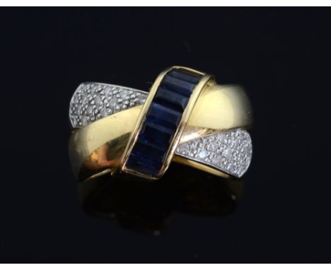 Sapphire and diamond entwined gold band ring. set with baguette cut sapphire to centre with a plain crossover gold band and a