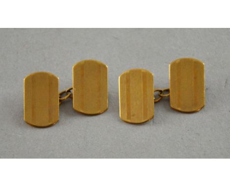 Pair of  gold cufflinks with engine turned decoration marked '375', and 9 ct
