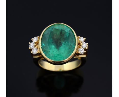 Emerald and diamond ring, oval-cut emerald weighing approximately 10.00cts in a rub-over setting with three round brilliant-c