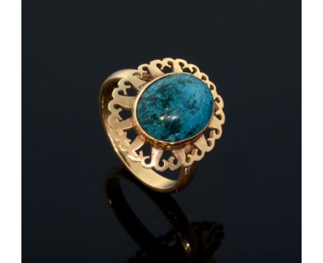 Chrysocolla dress ring. in yellow metal tested as 9ct.