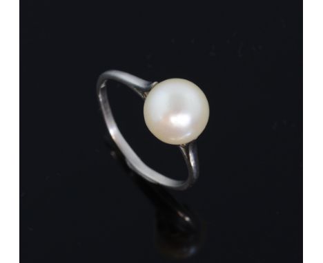 Single pearl set ring. mounted in white metal testing as platinum platinum  