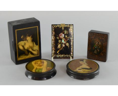 Two early 19th Century papier mache snuff boxes decorated with females, a mother of pearl inlaid note case  a similar snuff b
