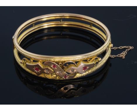 Victorian hinged bangle, with ruby and diamond in star setting.