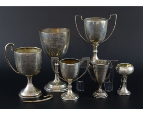 Victorian silver goblet with knopped stem on round foot, maker's mark rubbed, Birmingham, 1866, and five silver trophy cups, 