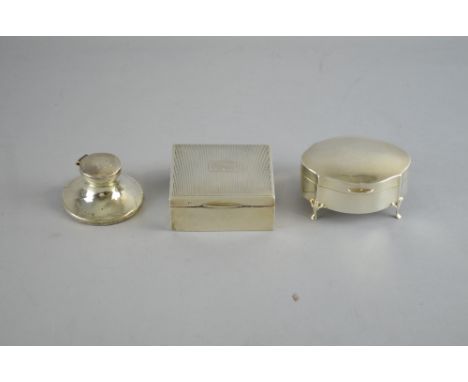 Small silver capstan inkwell, silver cigarette box, silver oval trinket box dated for 1914