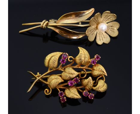Two gold floral brooches. fruiting branch brooch set with rubies and a pearl set ruby brooch, both 9ct  