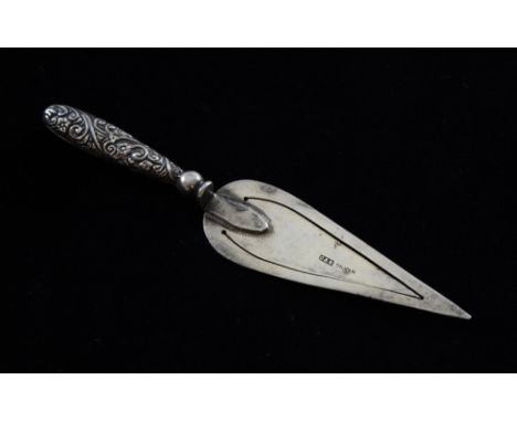 Silver bookmark of trowel form by Christian and Norris with floral scrolled handle,