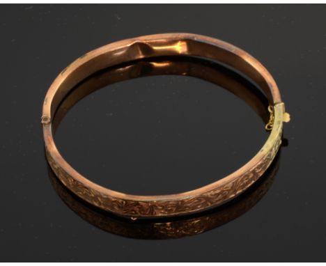  Gold bangle and a pair of cufflinks. bangle  in fitted case and a pair of  gold cufflinks in fitted case, both 9ct 