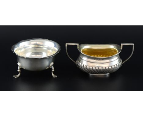 George VI silver sugar bowl with half-gadrooned body, maker's mark rubbed, Birmingham, 1945, and another with wavy rim on thr