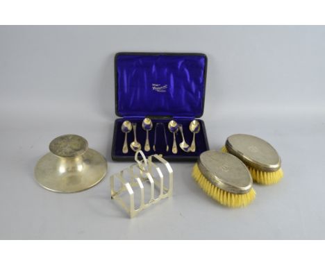 George VI silver four division toast rack, by Viner's Ltd., Sheffield, 1937, capstan inkwell, pair of silver back brushes, se