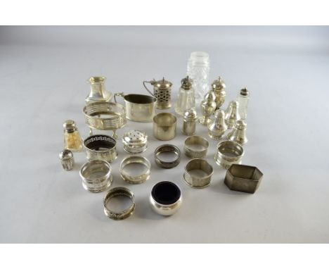 Edward VII silver mustard pot and cover, Birmingham, 1902 and a collection of small condiment containers and napkin rings,