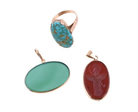  A cornelian pendant,   the oval panel carved with Ahura Mazda, in a polished setting, 3.8cm long including bale; a 1970s tur
