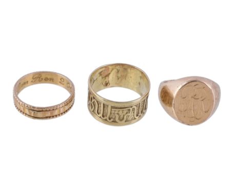  Three gold coloured rings,   the first a signet ring, finger size I; the second a band ring with applied astrological signs,