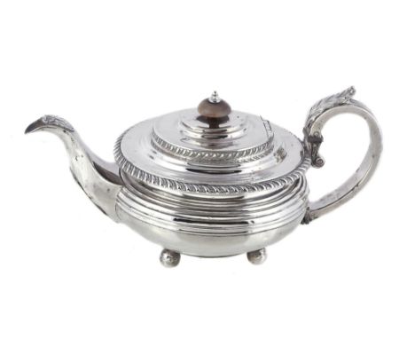  A George IV silver compressed spherical tea pot by William Bennett,   London 1824, with a composition button finial to the s