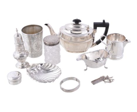  A collection of silver items,   to include: an Edwardian oval teapot by Josiah Williams  &  Co., London 1907, with a composi