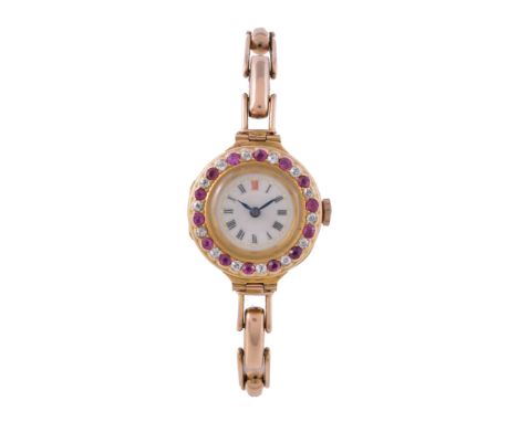  A lady's 18 carat gold, diamond and ruby bracelet wristwatch,   no. 81443, circa 1920, Swiss manual wind movement, 17 jewels