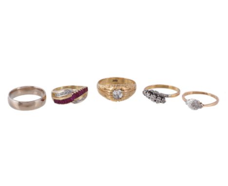  A small collection of rings,   comprising a ruby and diamond point ring, stamped 14k, finger size N; a gold coloured ring, s