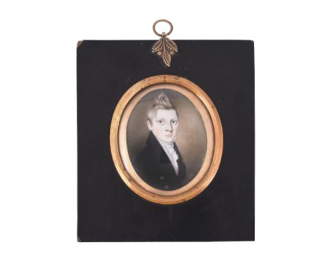 Ω English School, circa 1805 Portrait of a young gentleman with quiffed hair Watercolour on ivory Inscribed verso Captain Orm