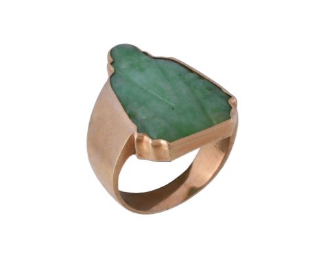  A 1960s jadeite jade ring,   the jadeite jade panel carved with a Chinese deity, possibly Shouxing, within a polished settin