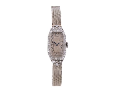  A lady's diamond set cocktail watch,   unmarked, circa 1930, manual wind movement, silvered dial, Arabic numerals, blued ste