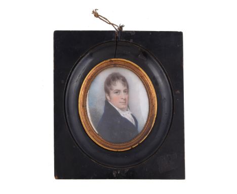 Ω William Wood (1769-1810) Portrait of a gentleman in blue frock coat Watercolour on ivory Inscribed verso By Will: Wood of C