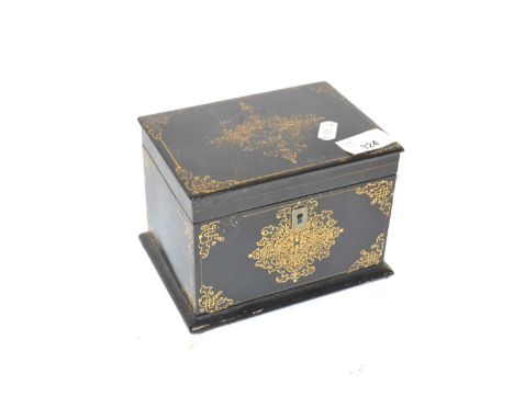 A lacquered tea caddy with gilt design 