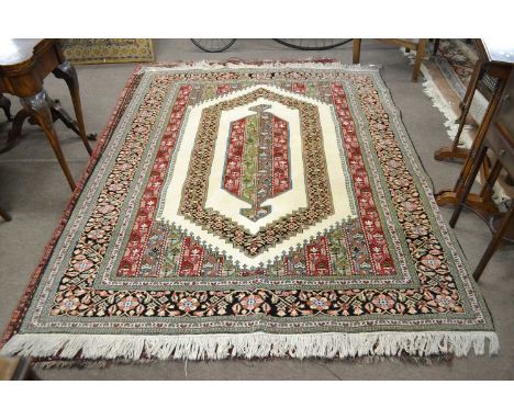 White ground wool carpet floral gulled borders