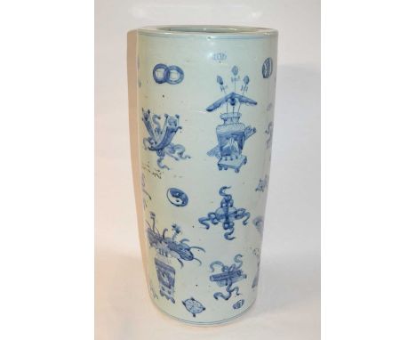 A Chinese porcelain stick stand, Ching Dynasty, decorated in pale tones of blue with auspicious objects, 60cm high