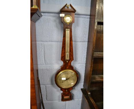 Zamera, London Georgian mahogany cased barometer with arched pediment, damp dry dial, thermometer, a silvered main dial and a