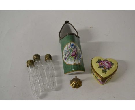 A heart shaped patch box with yellow ground, made by Limoges and a further Limoges enamel case containing three small scent b