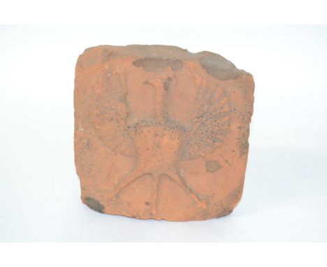 A roof tile circa 16th Century with bird like design, according to note found on a farm at Mendham or Metfield
