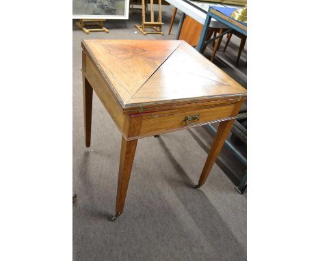 An Edwardian rosewood envelope formed card table