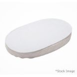 1 x STOKKE Sleepi™ Mini Protection Sheet Oval In White - Dimensions: 72 x 54cm - Unused Boxed