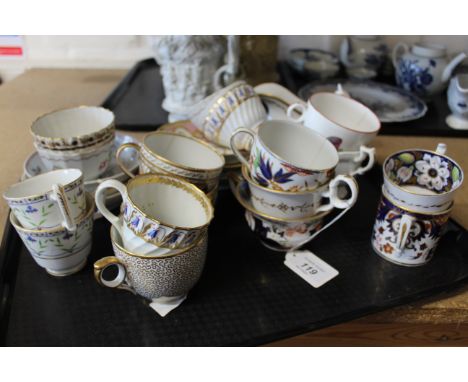 A large selection of late 18th and early 19th Century tea bowls with saucers and decorative cups and saucers (most non matchi