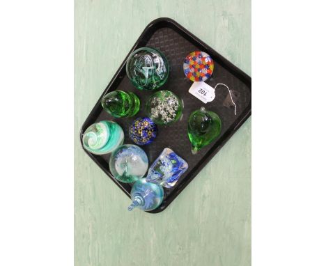 Four Caithness glass paperweights, a Murano millefiori factory example and five others