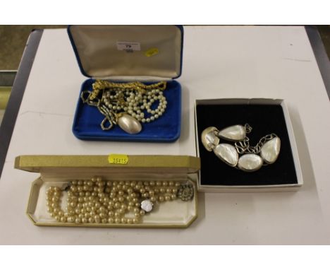 A white metal and mother of pearl necklace; together with simulated pearl necklaces etc.