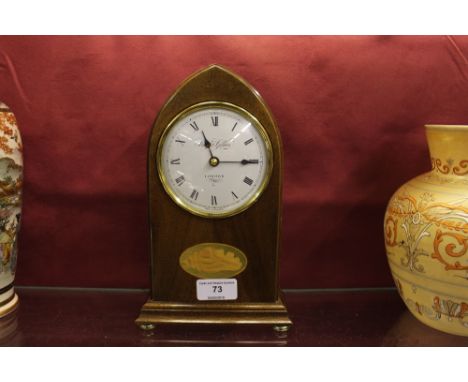 A Knight & Gibbins of London mahogany cased mantel clock