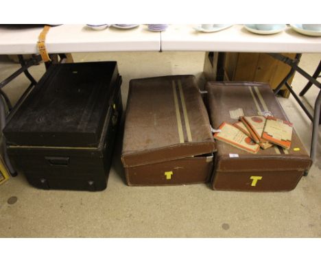 Two suitcases and a tin trunk of various maps