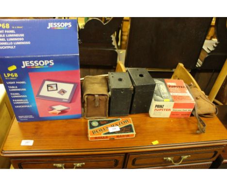 A quantity of camera equipment; a Jessop's light panel and  a Rolls razor