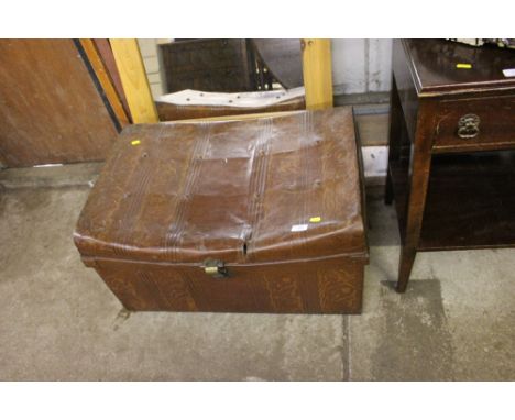 A tin trunk and various contents