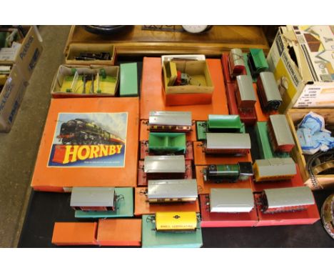 A collection of railwayana to include Hornby tinplate model carriages and trains, in original boxes; various accessories, rai